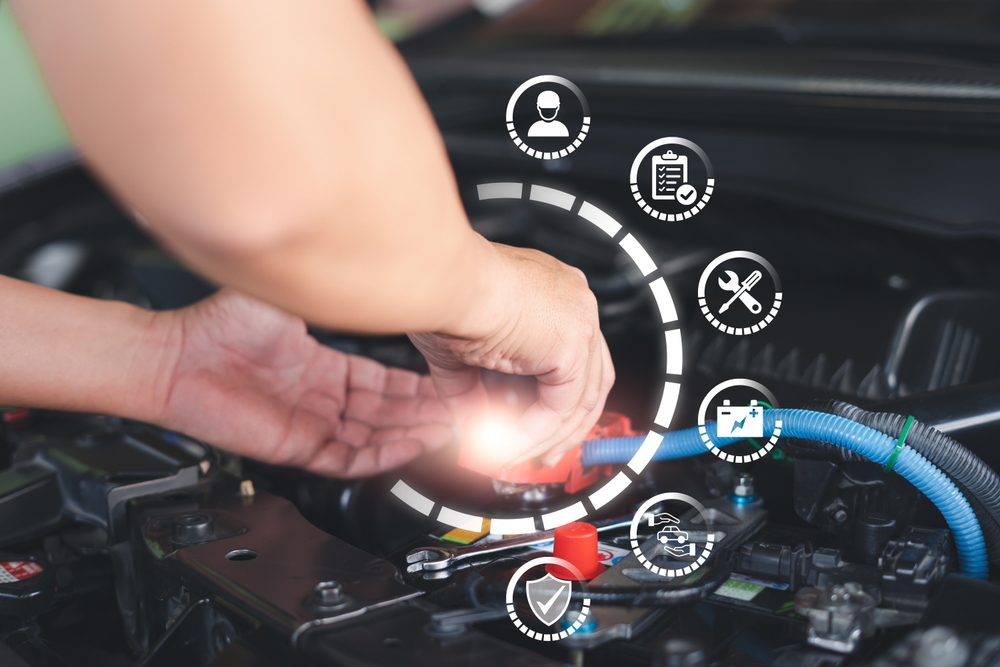 Nissan battery service diagnostics Knoxville TN, high-tech battery replacement for Nissan, Ted Russell Nissan certified battery care, battery health inspection symbols, modern battery service tools East Tennessee