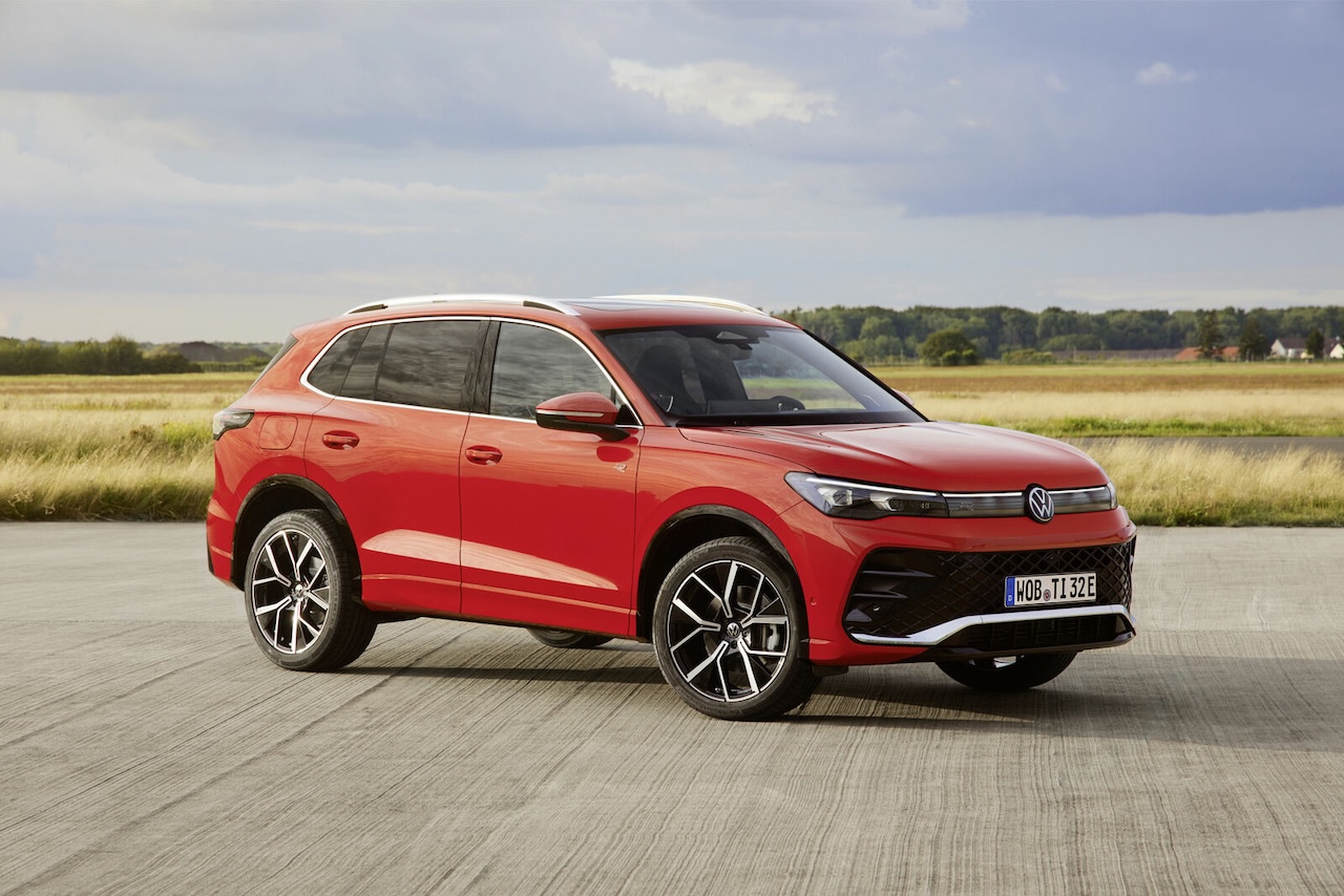 Red Volkswagen Tiguan parked outdoors, representing Volkswagen lease return service at Stone Mountain Volkswagen
